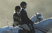 two_riders_horse_show_ring_192.jpg (46461 bytes)